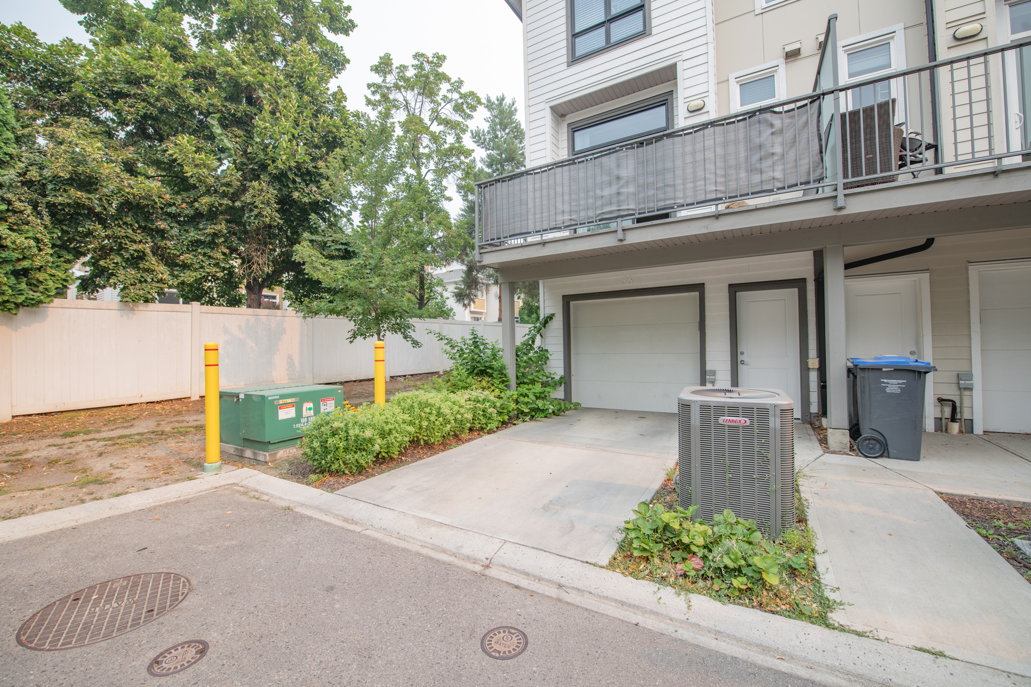 Attached garage and additional parking at unit 36