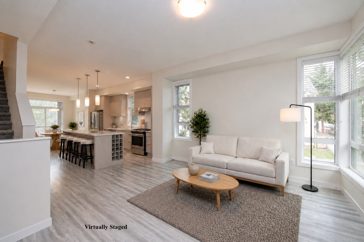 Virtually staged open living room and kitchen